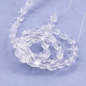 Perle ovale à facettes en verre cristal 6x4mm - Trou: 0.8mm (1 Fil-40cm)